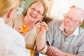 Doctor or Nurse Explaining Prescription Medicine to Senior Adult Couple Royalty Free Stock Photo
