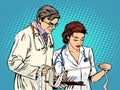 Doctor and nurse looking cardiogram Royalty Free Stock Photo