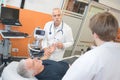 Doctor and nurse measuring blood pressure senior patient Royalty Free Stock Photo