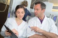 Doctor and nurse preparing patient mammography