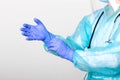 Doctor, nurse wearing protection Suit for Fighting Covid-19 Coronavirus with white background. Medical worker wearing protective