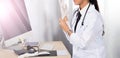 Doctor Nurse in white blue shirt with stethoscope and rubber gloves