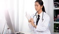 Doctor Nurse in white blue shirt with stethoscope and rubber gloves