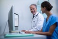 Doctor and nurse working on computer Royalty Free Stock Photo