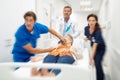 Doctor and nurses running in hospital for emergency Royalty Free Stock Photo