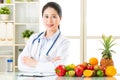 Doctor nutritionist with fruits and vegetable