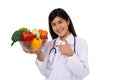 Doctor or nutritionist holding fresh fruit Orange, red and green apples and smile in clinic. Healthy diet Concept of nutrition Royalty Free Stock Photo