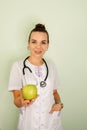 Doctor nutritionist writing case history, dietitian prescribing recipe