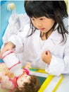 Doctor occupation role playing girl Royalty Free Stock Photo