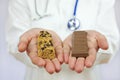 Doctor Offering Granola Bar and Chocolate