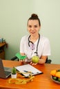 Doctor offering pills and apple to choose. Health, treatment, flu Royalty Free Stock Photo