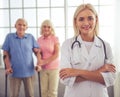 Doctor and old people Royalty Free Stock Photo