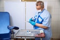 Doctor in operating room writing in notebook. Concept of a hospital and healthy Royalty Free Stock Photo