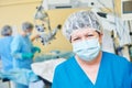 Doctor ophthalmologist surgeon in operation room Royalty Free Stock Photo