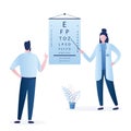 Doctor optometrist checks vision in a male patient. Eye test chart. Vision test. Optical exam. Healthy sigh Royalty Free Stock Photo