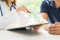 Doctor and patient are discussing something, medical diagnosis c Royalty Free Stock Photo