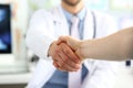 Doctor and patient handshake