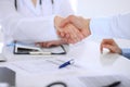 Doctor and patient handshaking. Hands close-up Royalty Free Stock Photo