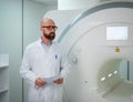 Doctor with a patient medical card near MRI scanner in a hospital Royalty Free Stock Photo