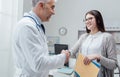 Doctor and patient shaking hands Royalty Free Stock Photo