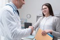 Doctor and patient shaking hands Royalty Free Stock Photo