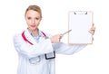 Doctor pen point to clipboard Royalty Free Stock Photo