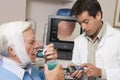 Doctor Performing Laryngoscopy On Patient Royalty Free Stock Photo