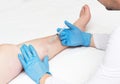 Doctor performs sclerotherapy for varicose veins on the legs, varicose vein treatment, copy space, injection