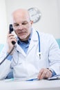 Doctor on the phone Royalty Free Stock Photo