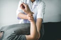 Doctor or Physiotherapist working examining treating injured arm of athlete male patient, stretching and exercise, Doing the Royalty Free Stock Photo