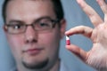 Doctor with pill Royalty Free Stock Photo