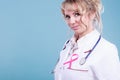 Doctor with pink cancer ribbon