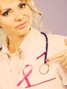 Doctor with pink cancer ribbon