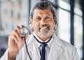 Doctor, portrait and happy man with stethoscope in cardiology, healthcare service and support or check. Heart, patient Royalty Free Stock Photo