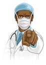 Doctor in PPE Mask Pointing Needs You Royalty Free Stock Photo