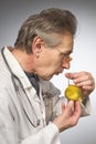 Practicioner in white gown determining disease with test tube of urine Royalty Free Stock Photo