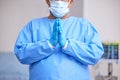 Doctor, praying and hands with healthcare and surgery, seek guidance from God and worship, hope and operation room