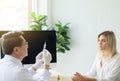 Doctor prepare giving vaccine to woman patient with injection or syringe in hospital room Royalty Free Stock Photo