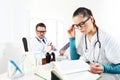 Doctor prescribes prescription with the tablet and nurse read Royalty Free Stock Photo