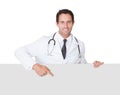 Doctor presenting empty banner