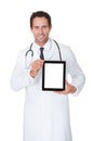 Doctor presenting empty digital tablet Royalty Free Stock Photo