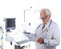 Doctor in pulmonary function lab looking at a clipboard