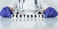 The doctor put together a word from cubes PERTUSSIS