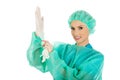 Doctor putting sterilized medical glove.
