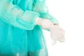 Doctor putting sterilized medical glove. Royalty Free Stock Photo