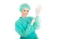 Doctor putting sterilized medical glove. Royalty Free Stock Photo