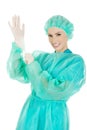 Doctor putting sterilized medical glove. Royalty Free Stock Photo