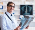Doctor radiologist looking at x-ray images Royalty Free Stock Photo