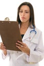 Doctor reading medical records Royalty Free Stock Photo