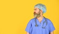 Doctor ready to help. Diagnosis concept. Global health emergency. Man bearded doctor wear uniform cap. Hipster work at